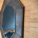 old mirror of octagonal shape.