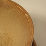 Two sandstone bowls and saucers
