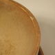 Two sandstone bowls and saucers
