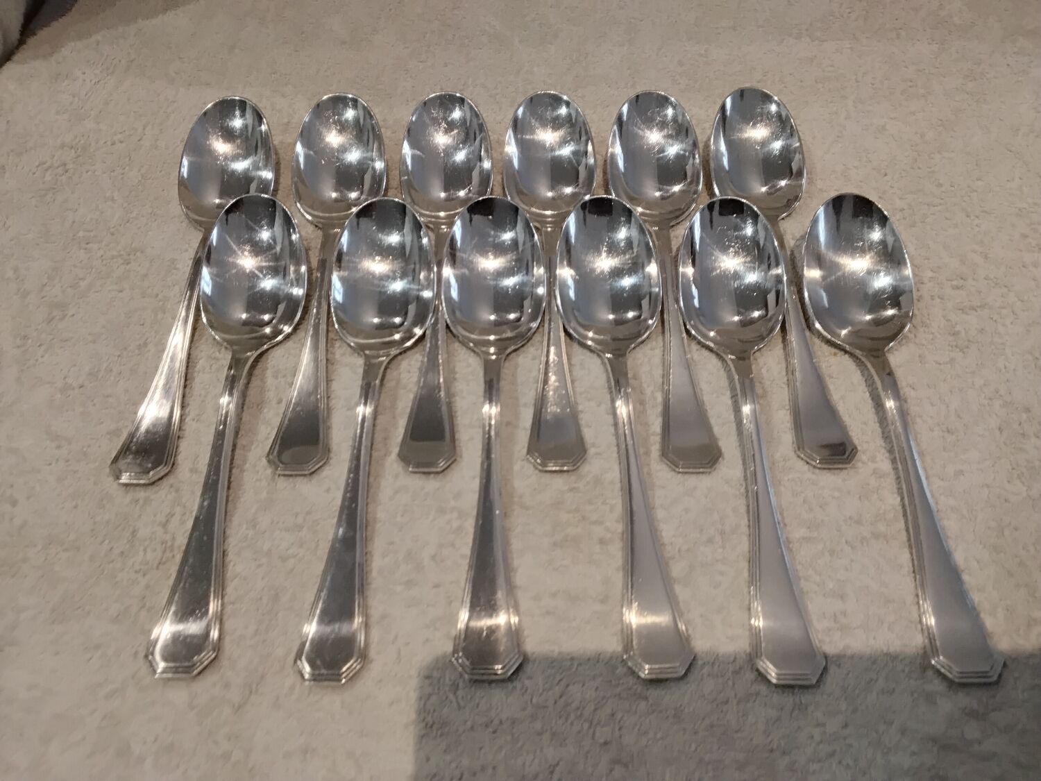 12 silver-plated soup spoons by Christofle America