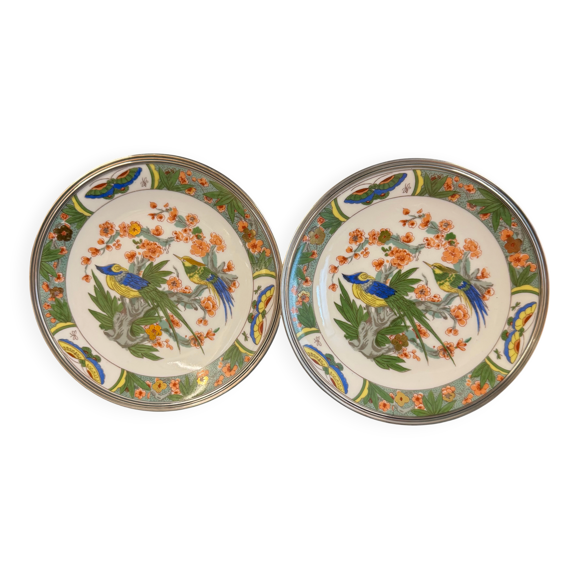 Two Raynaud Limoges plates and Tetard brothers silver.