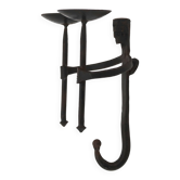 Anthropomorphic wall candle holder in wrought iron, 1950s.