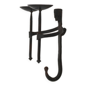Anthropomorphic wall candle holder in wrought iron, 1950s.