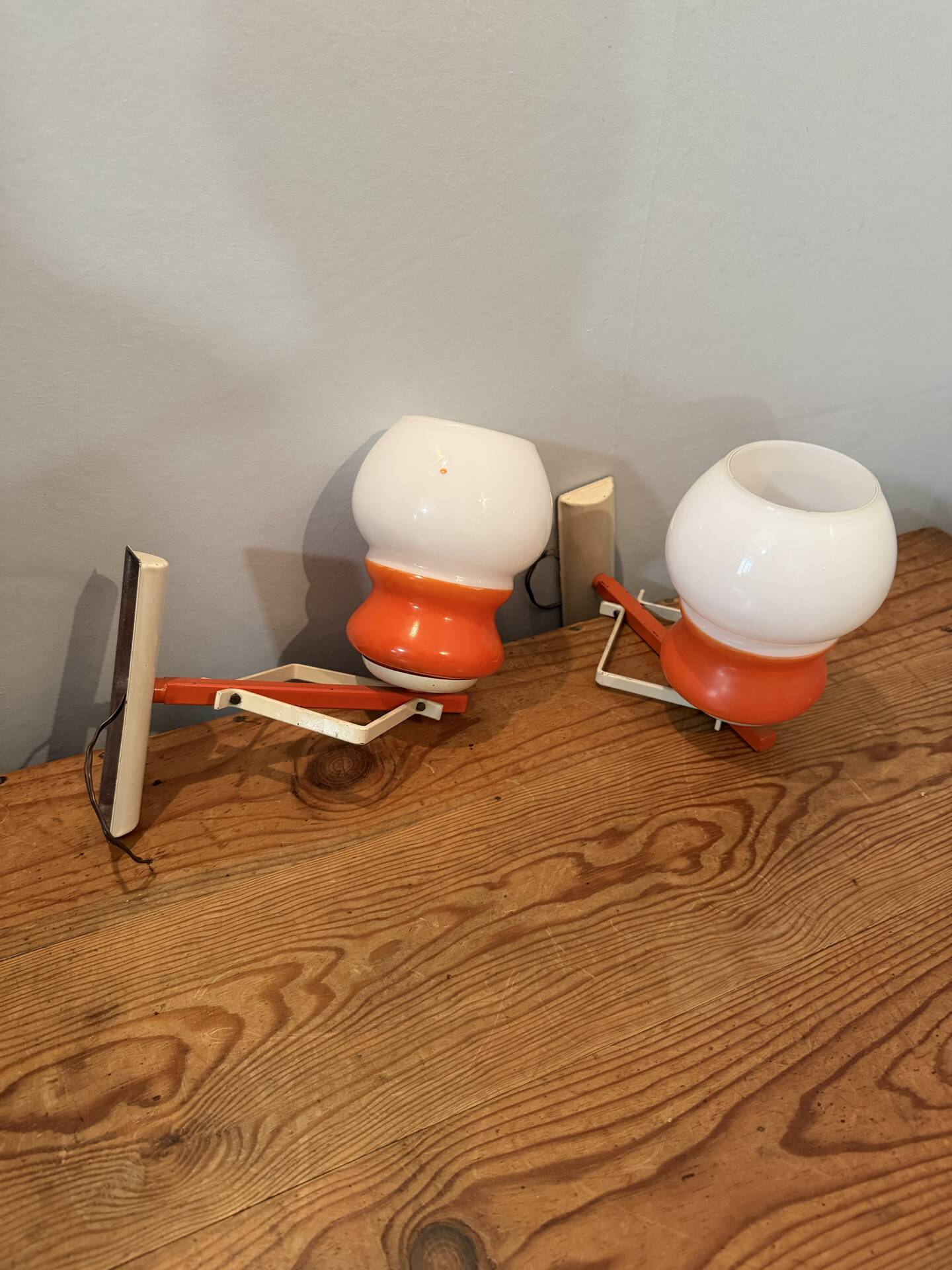 Pair of Space Age design wall lights in metal and vintage opaline.
