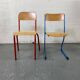 Set of 2 mismatched industrial school chairs
