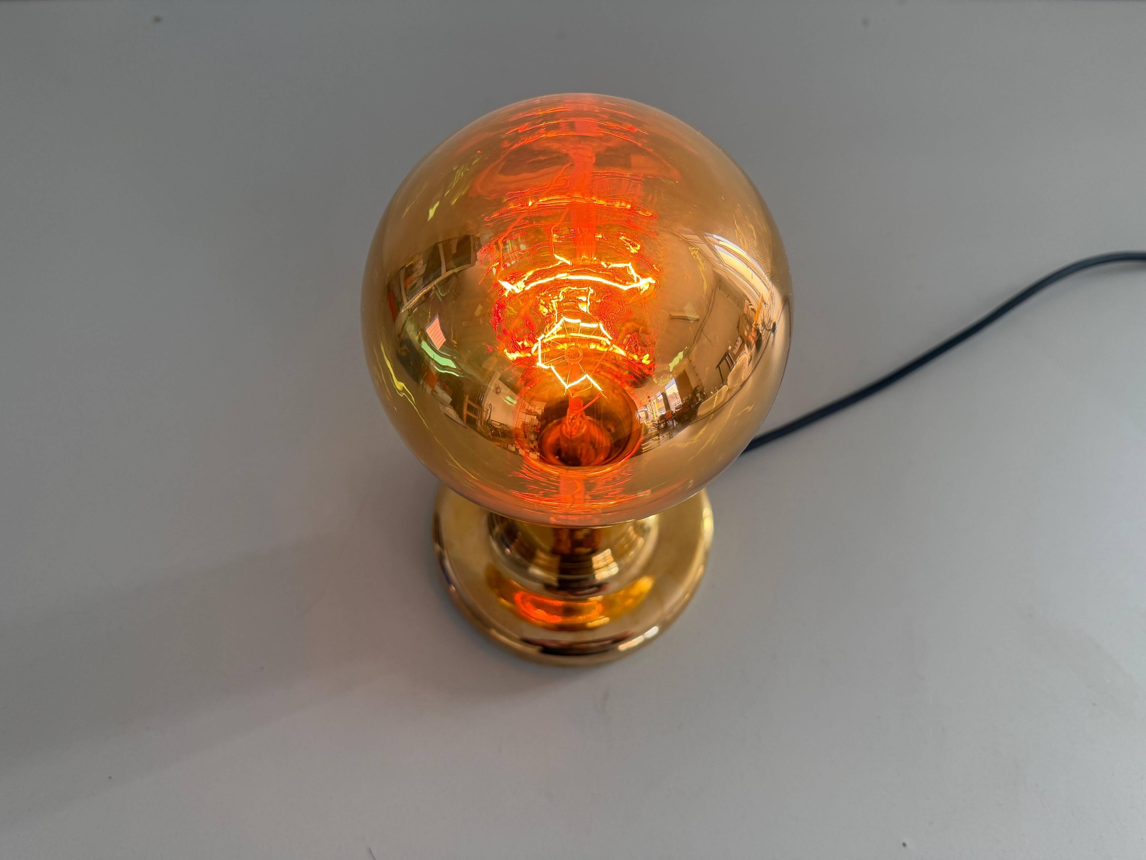 Simple table lamp in gilded porcelain by Philips NTD, 1960s, Germany.