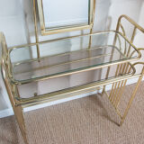 Dressing table in gold metal