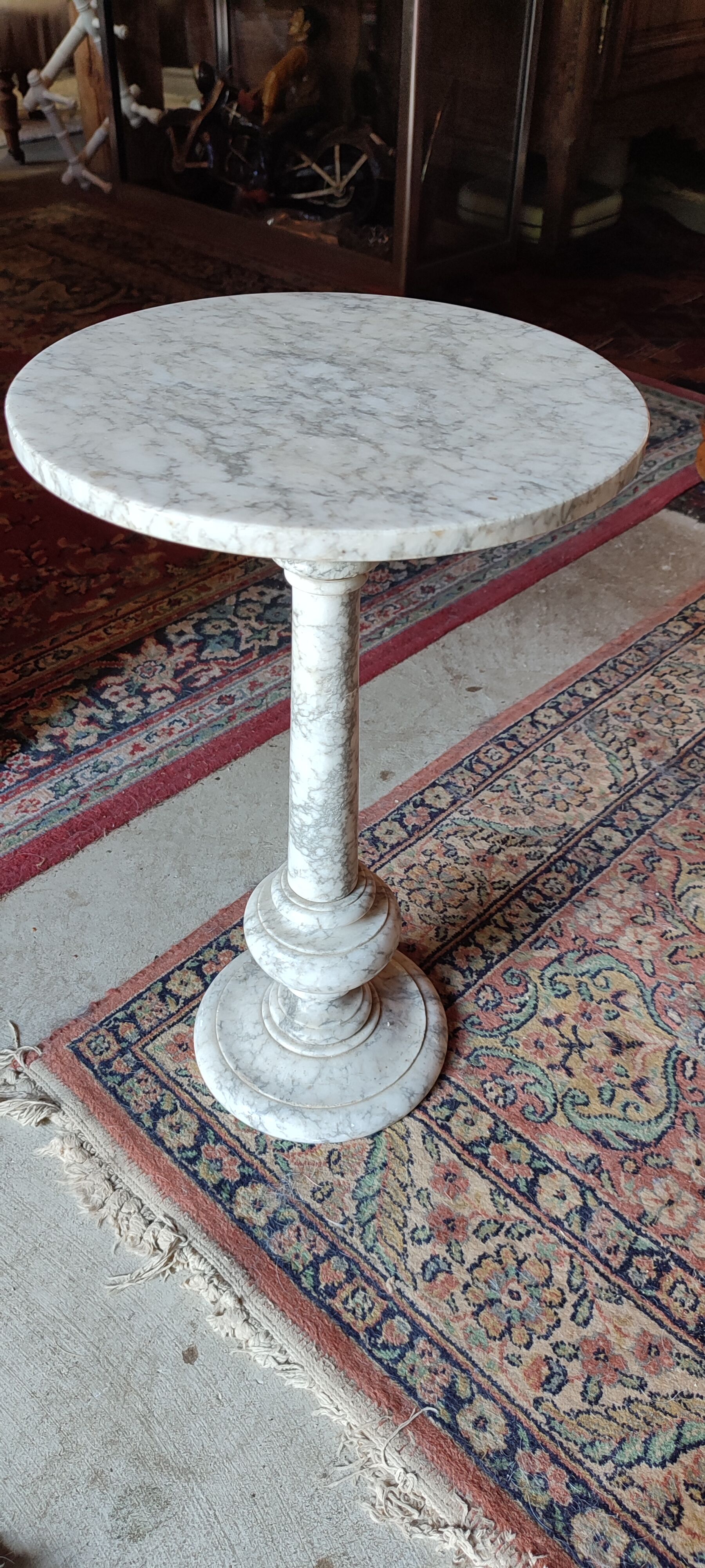 White marble harness pedestal table