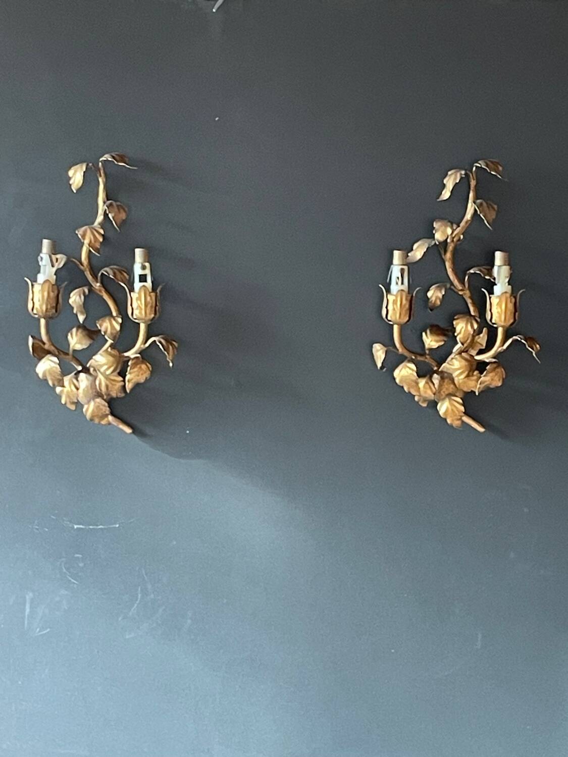 Pair of gold wall sconces