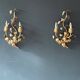 Pair of gold wall lights