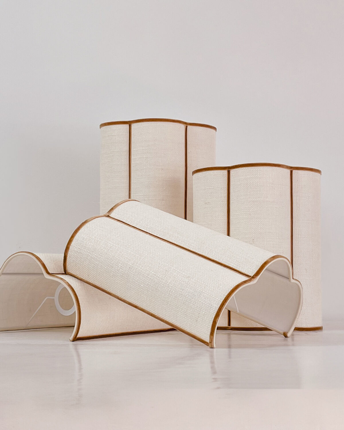 Pair of cream jute wall sconces and bronze velvet