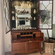 Library with English mahogany secretary.
