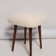 Set of two mid-century modern light beige boucle stools, Europe, 1960s.