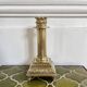 Empire style gold candle holder