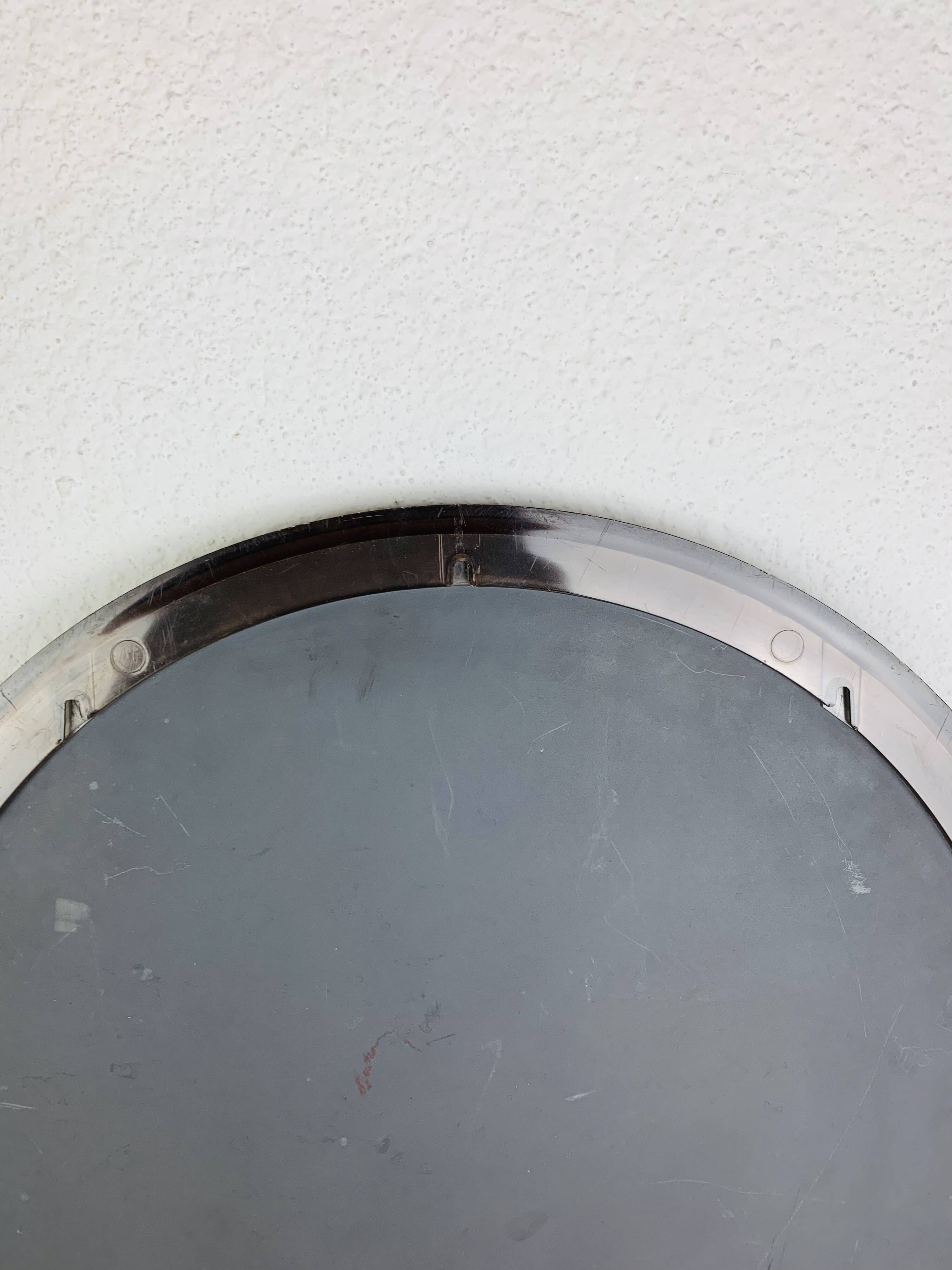 Miroir rond cerclage ambré années 70 vintage