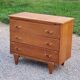Vintage chest of drawers in golden oak from the 50s with 3 drawers and spindle-legged shelf