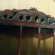 Carved wooden wall shelf for collection or other.