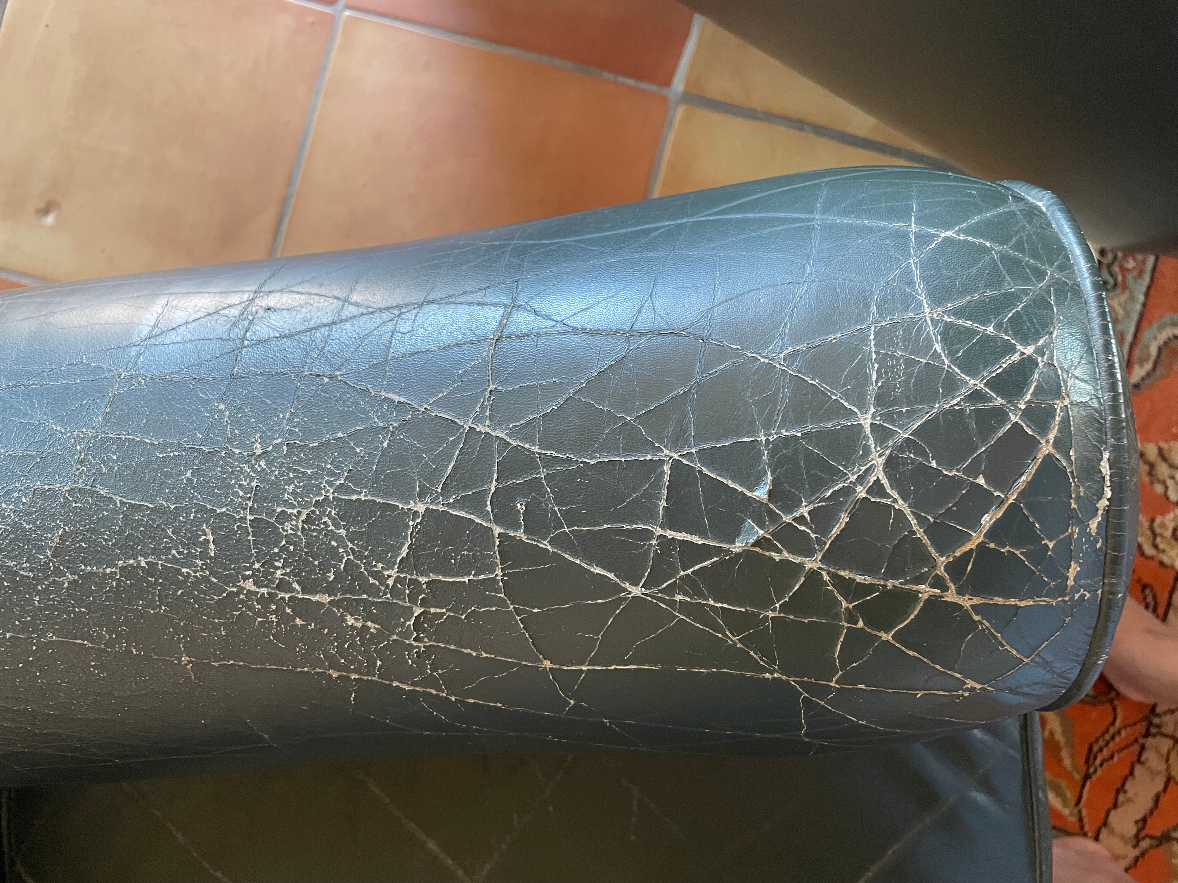 Green leather club chairs