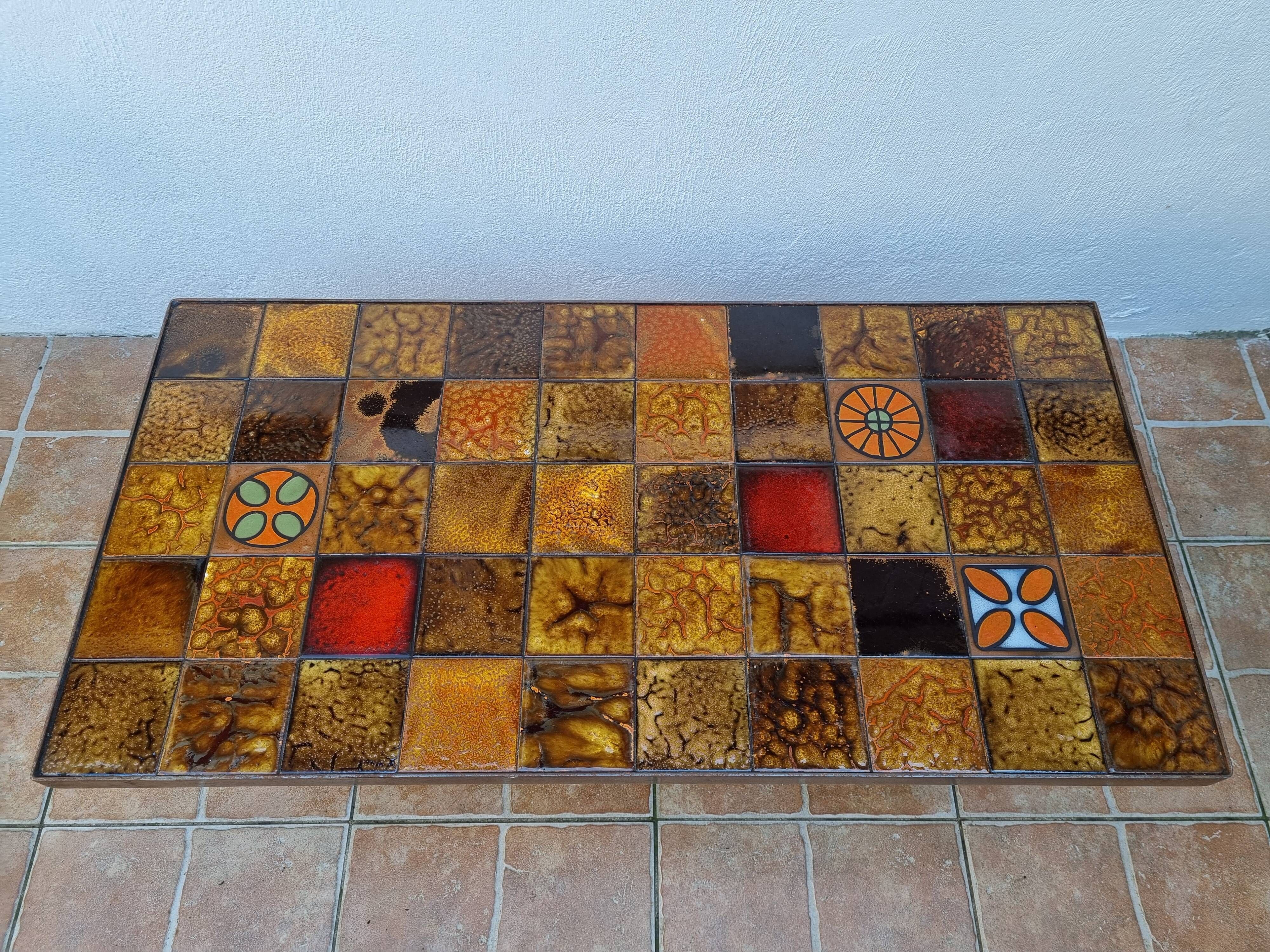 Vintage coffee table "Moulin de la roue" Vallauris in glazed ceramic and forged metal