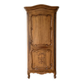Antique wardrobe in classic style made of solid wood.