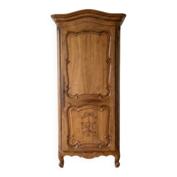 Antique wardrobe in classic style made of solid wood.