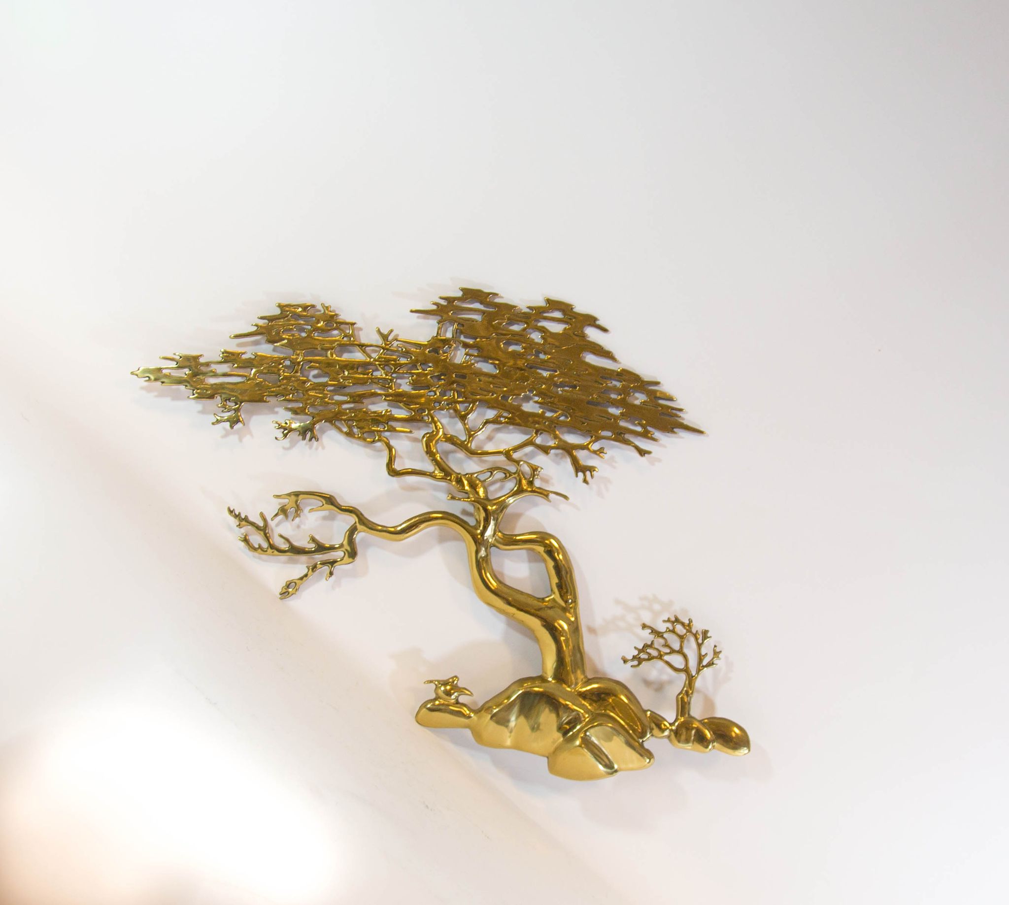 Brass wall sculpture
