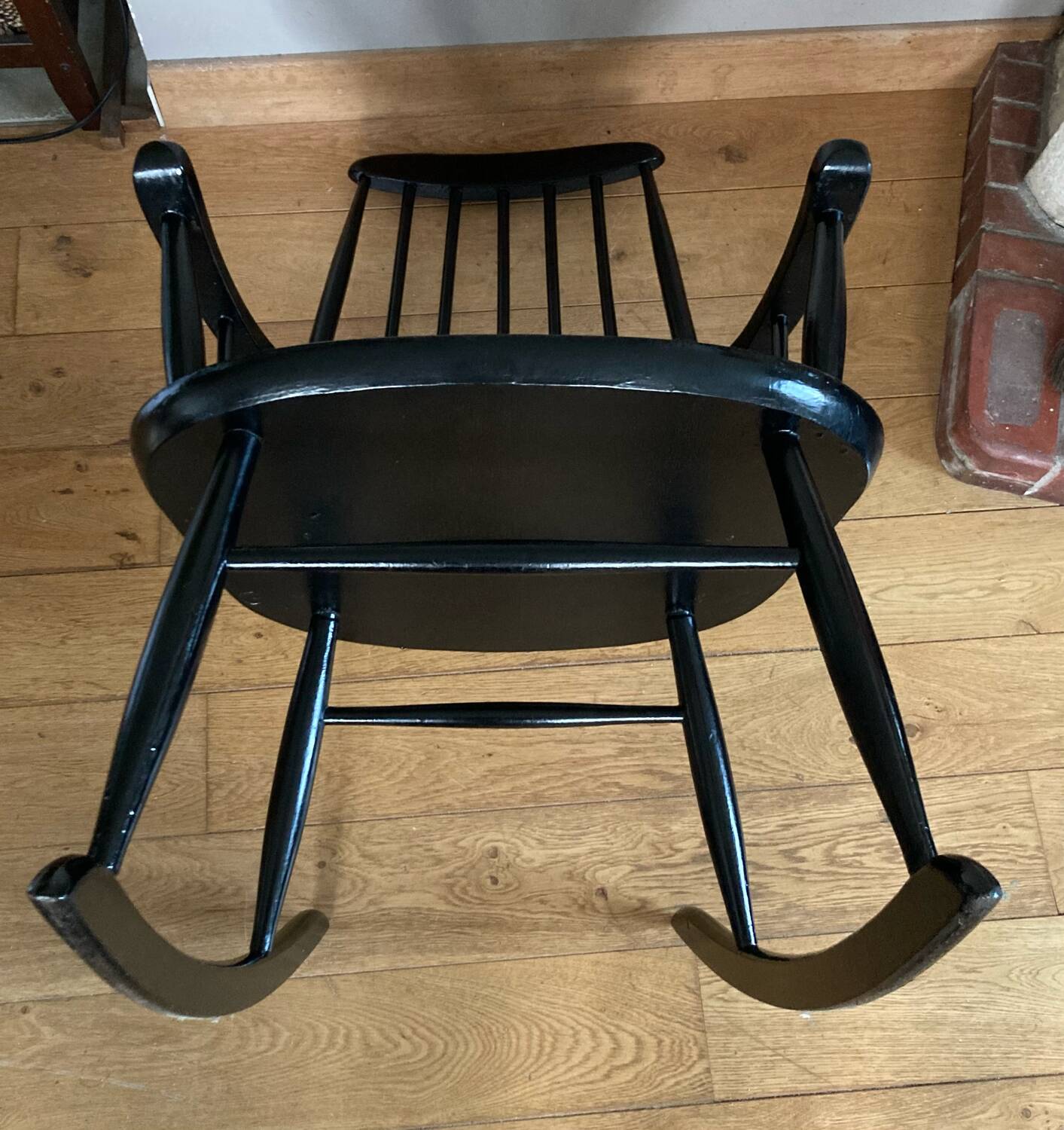 Vintage Scandinavian rocking chair in blackened wood from the 1970s