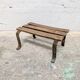 Antique iron and wood footrest