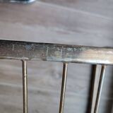 Chaise métallique tubulaire recouverte de dorure
