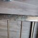 Tubular metal chair covered with gilding