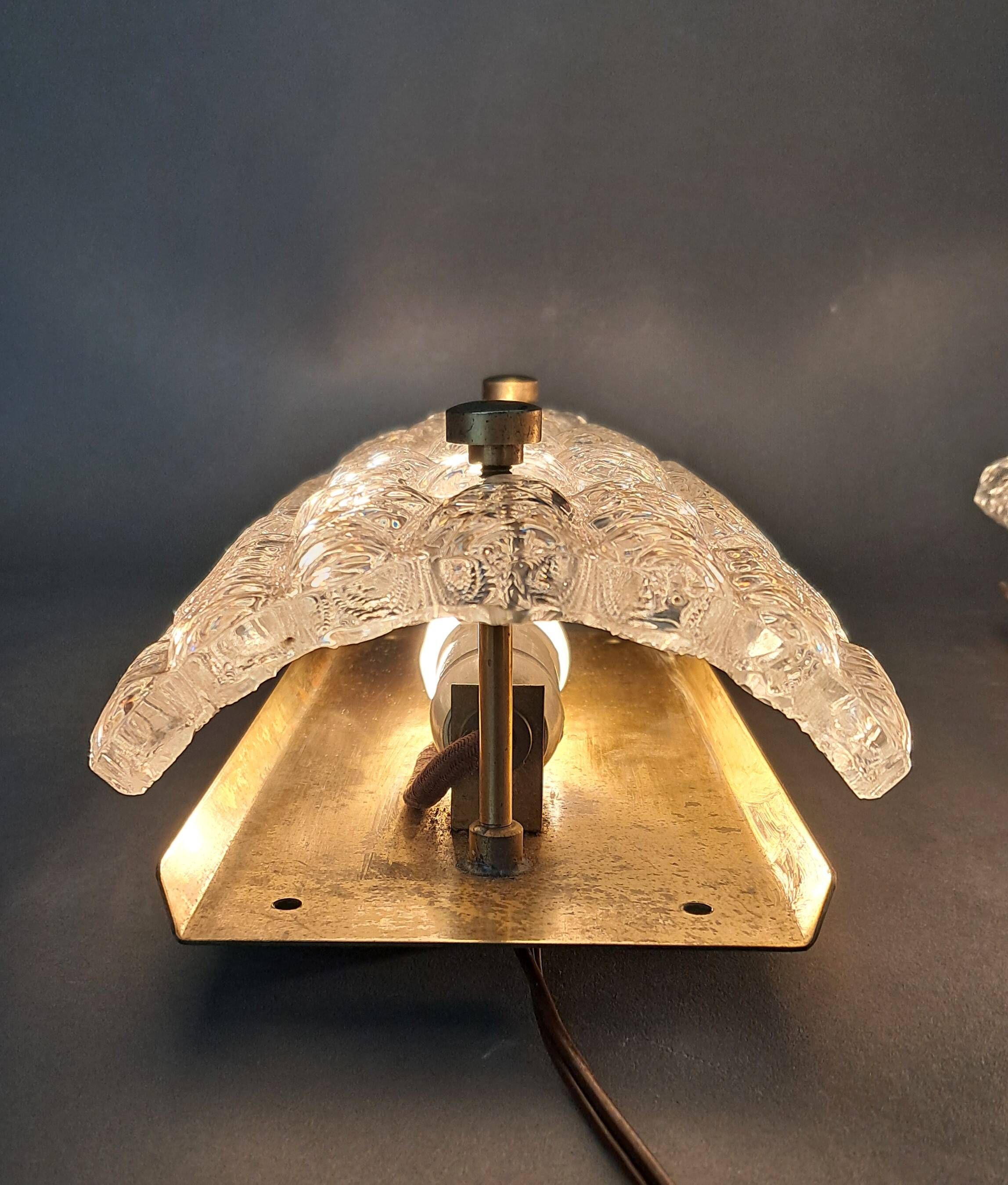 Pair of gilt brass and crystal sconces by Carl Fagerlund for Orrefors, 1960.