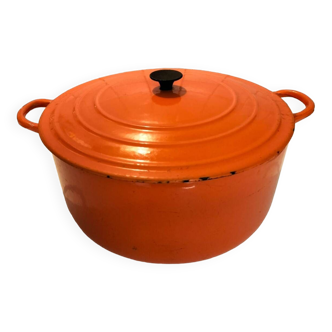Orange cast iron creuset casserole