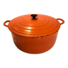 Orange cast iron creuset casserole