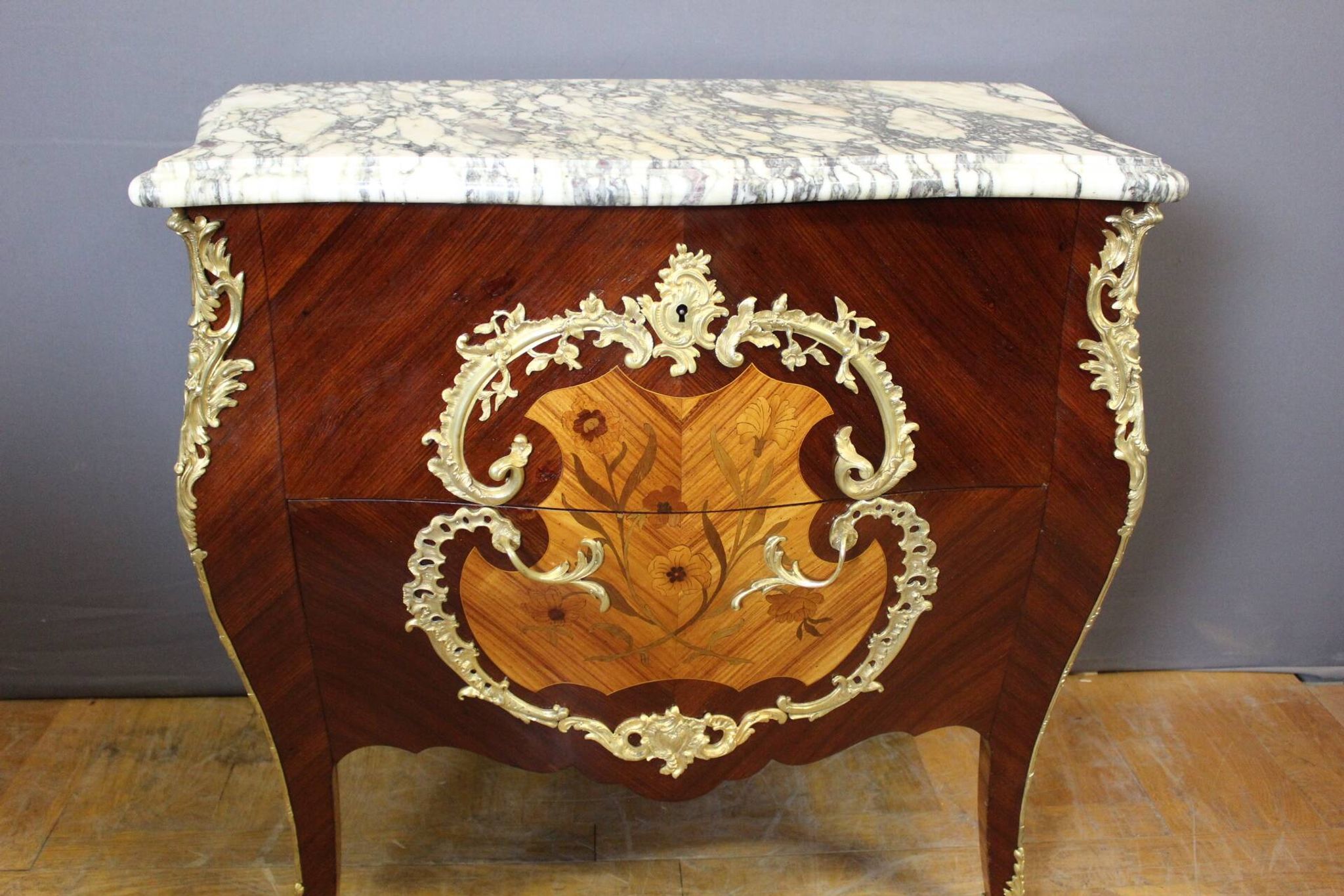 Louis XV style commode in marquetry around 1900