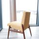 Fauteuil vintage jaune bouclé 1970