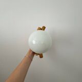 Rattan and opaline wall light