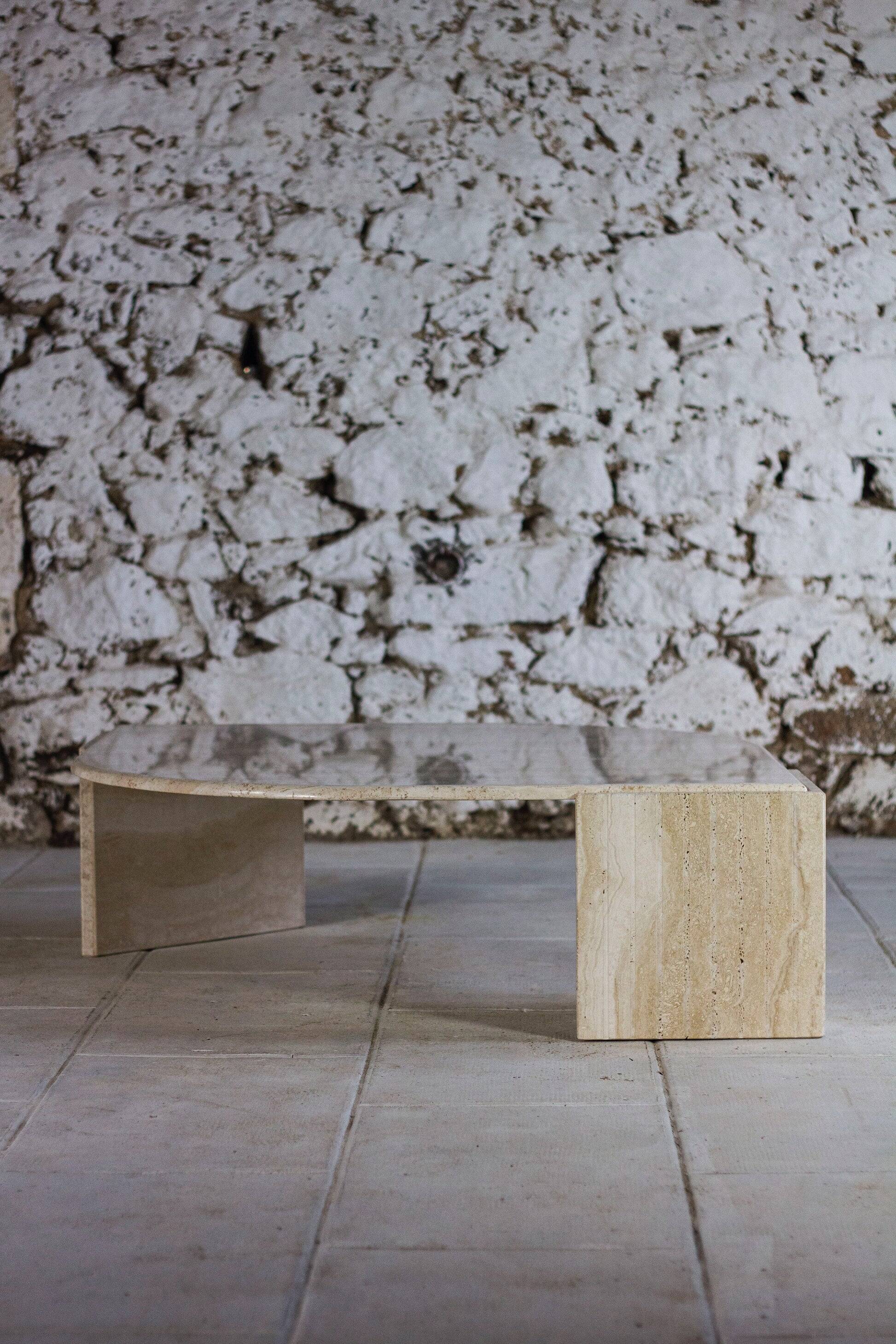 Travertine coffee table "Eye" or "drop" by Roche Bobois, 1980