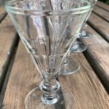 4 glasses of moulded pressed glass wine on foot