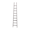 Old vertical ladder in industrial metal