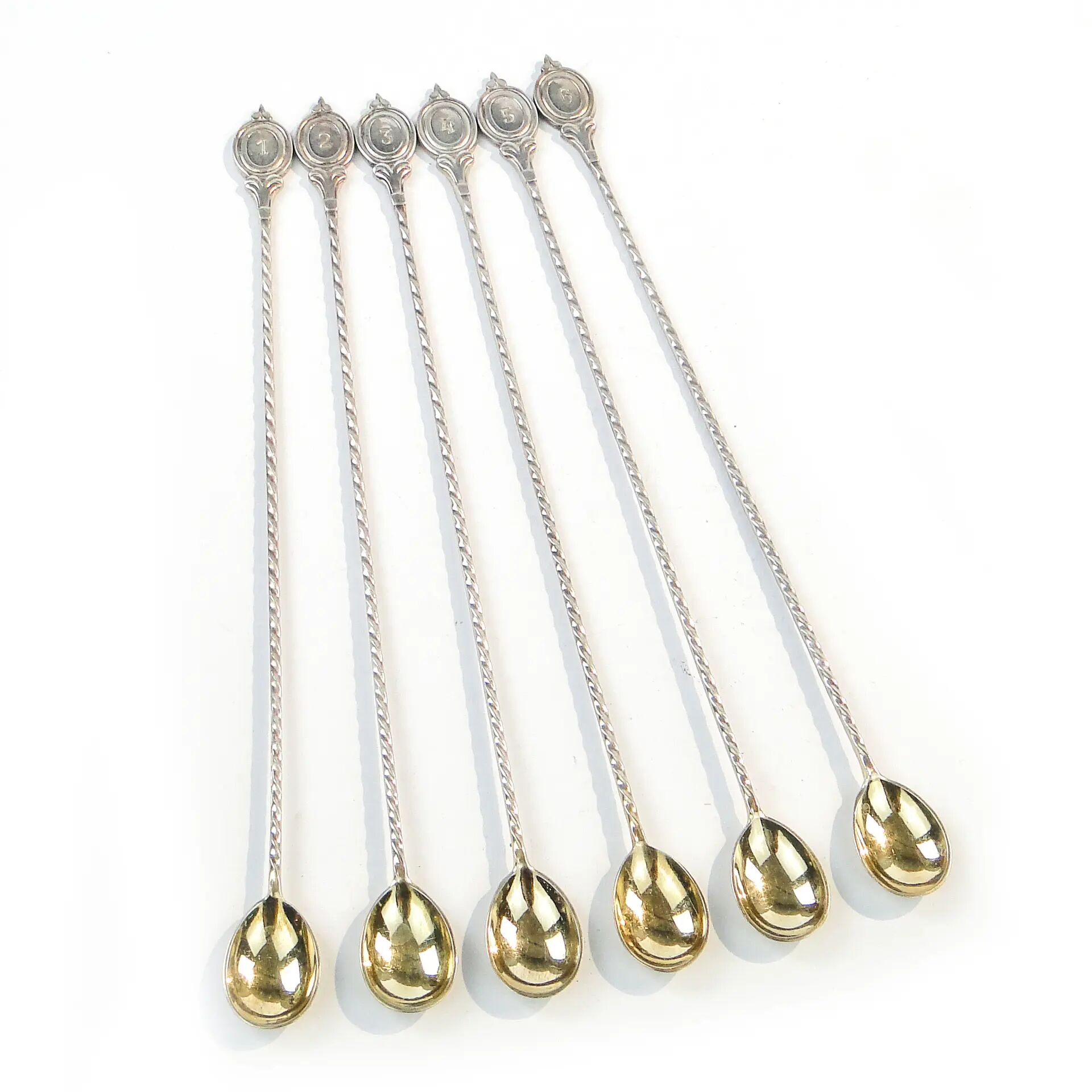 Set of neoclassical cocktail spoons, silver-plated brass, G.A.B., Sweden, 1930s