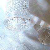 Small round carafe in highly worked cut crystal with stopper
