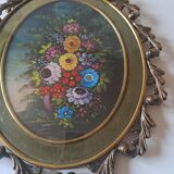Painted under glass convex medallion in bronze