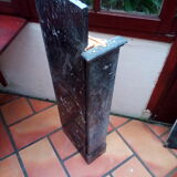 White veined black marble fireplace