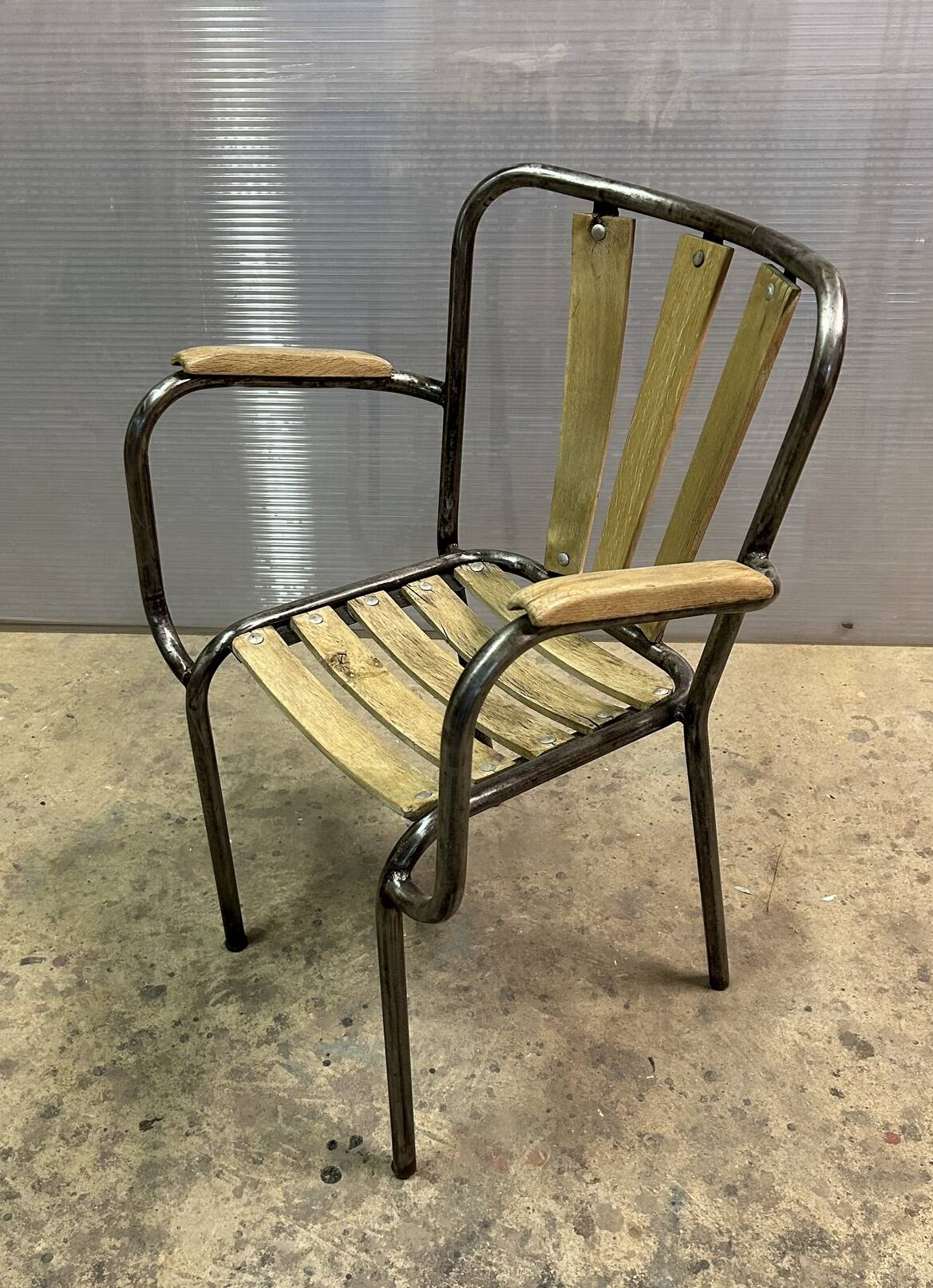 Industrial armchair in metal and wood
