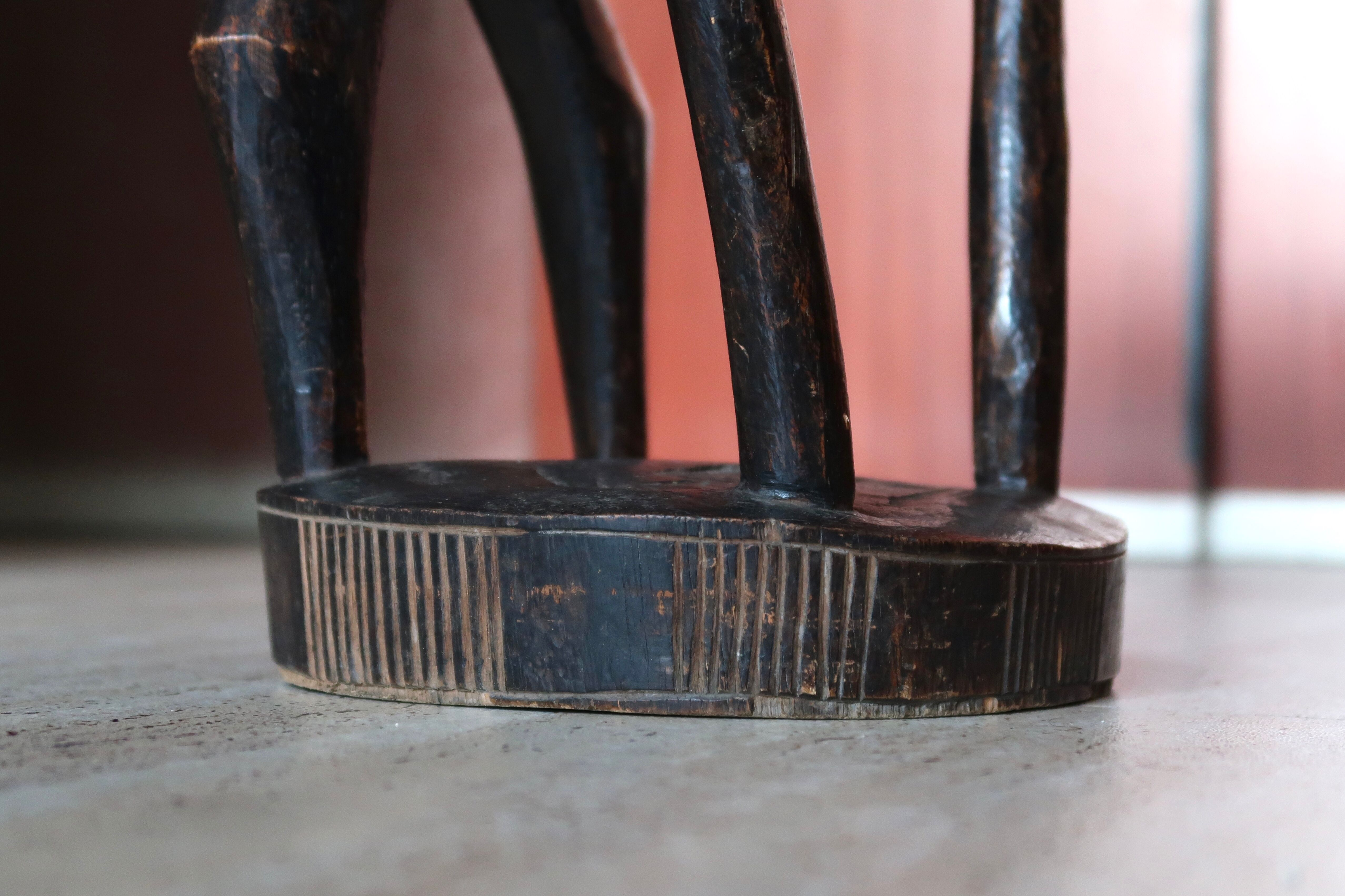 African zoomorphic wooden stool