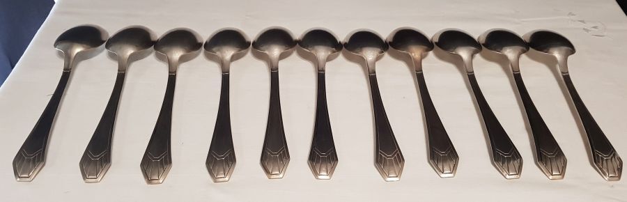 23-piece silver metal art deco cutlery set