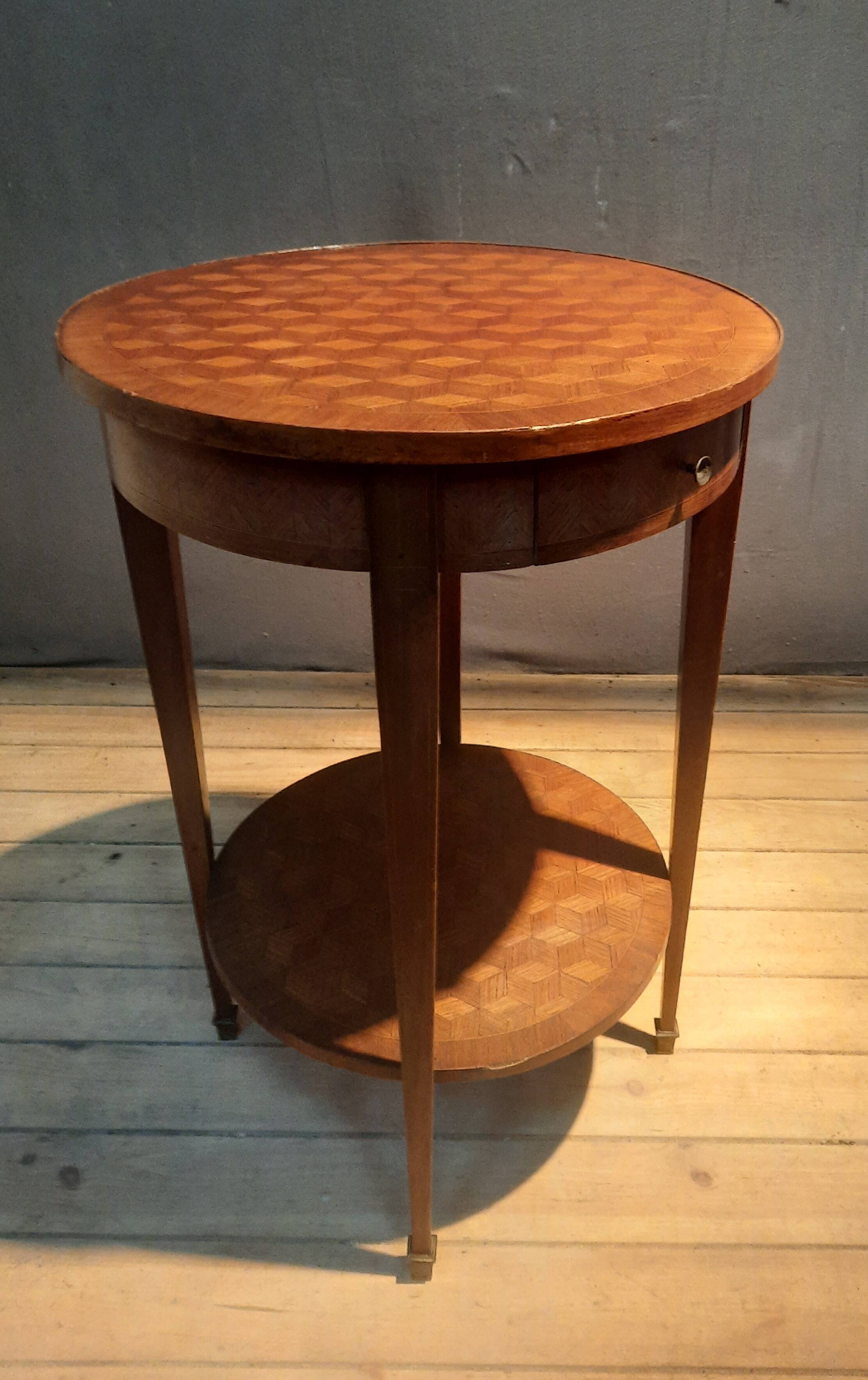 Round marquetry pedestal table with 2 shelves