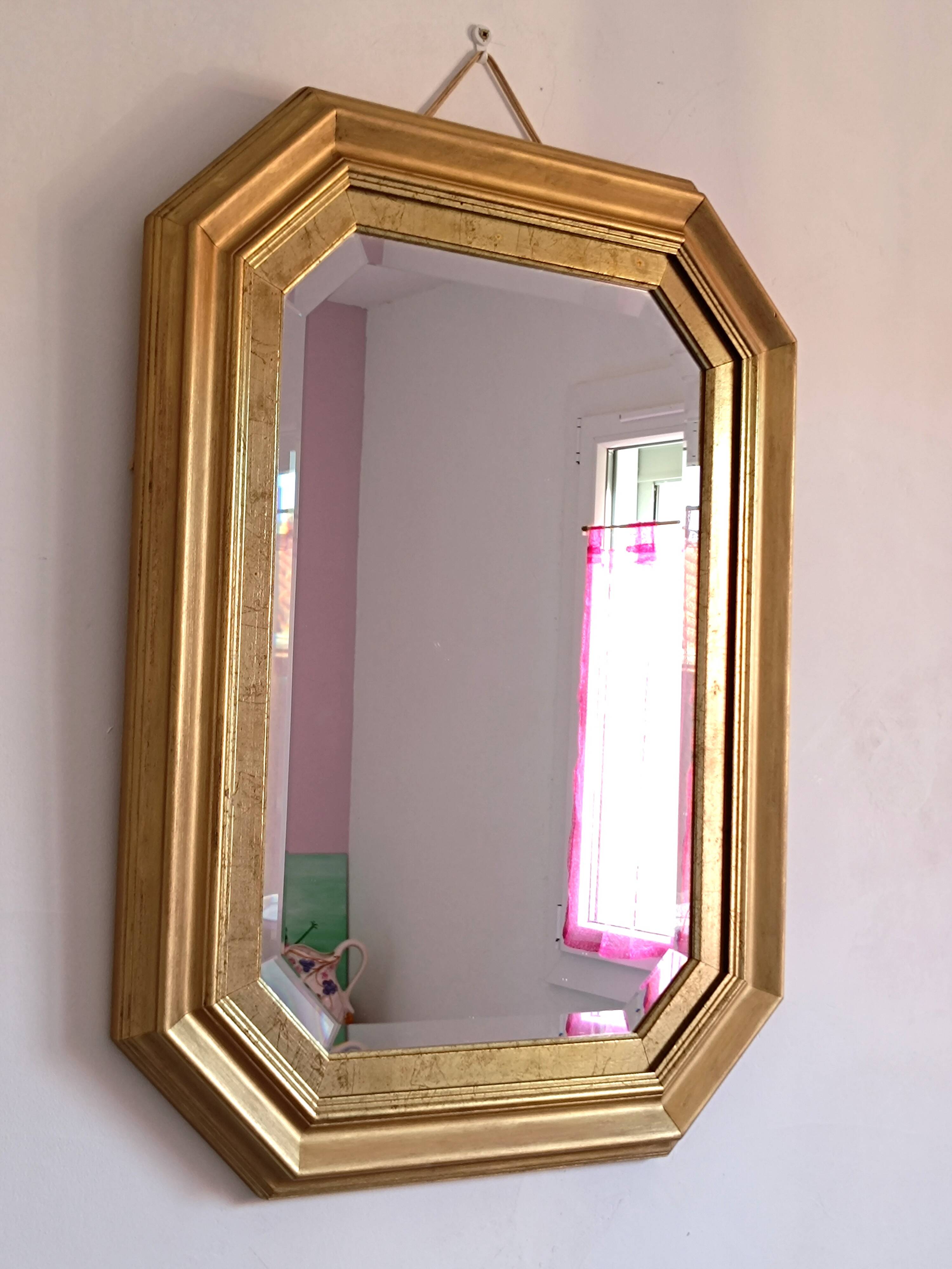 Octagonal gilded wooden mirror