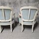 Pair of Louis XV style armchairs in patinated wood, light blue fabric.