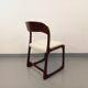 Vintage sled chair by Baumann in wood and boucle fabric.